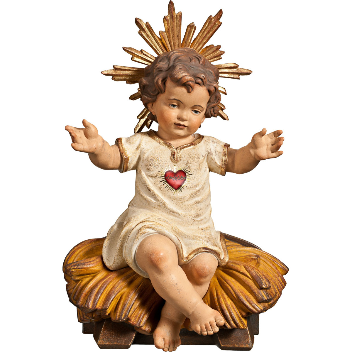 Niño Jesús vestido con Corazón sentado en cuna